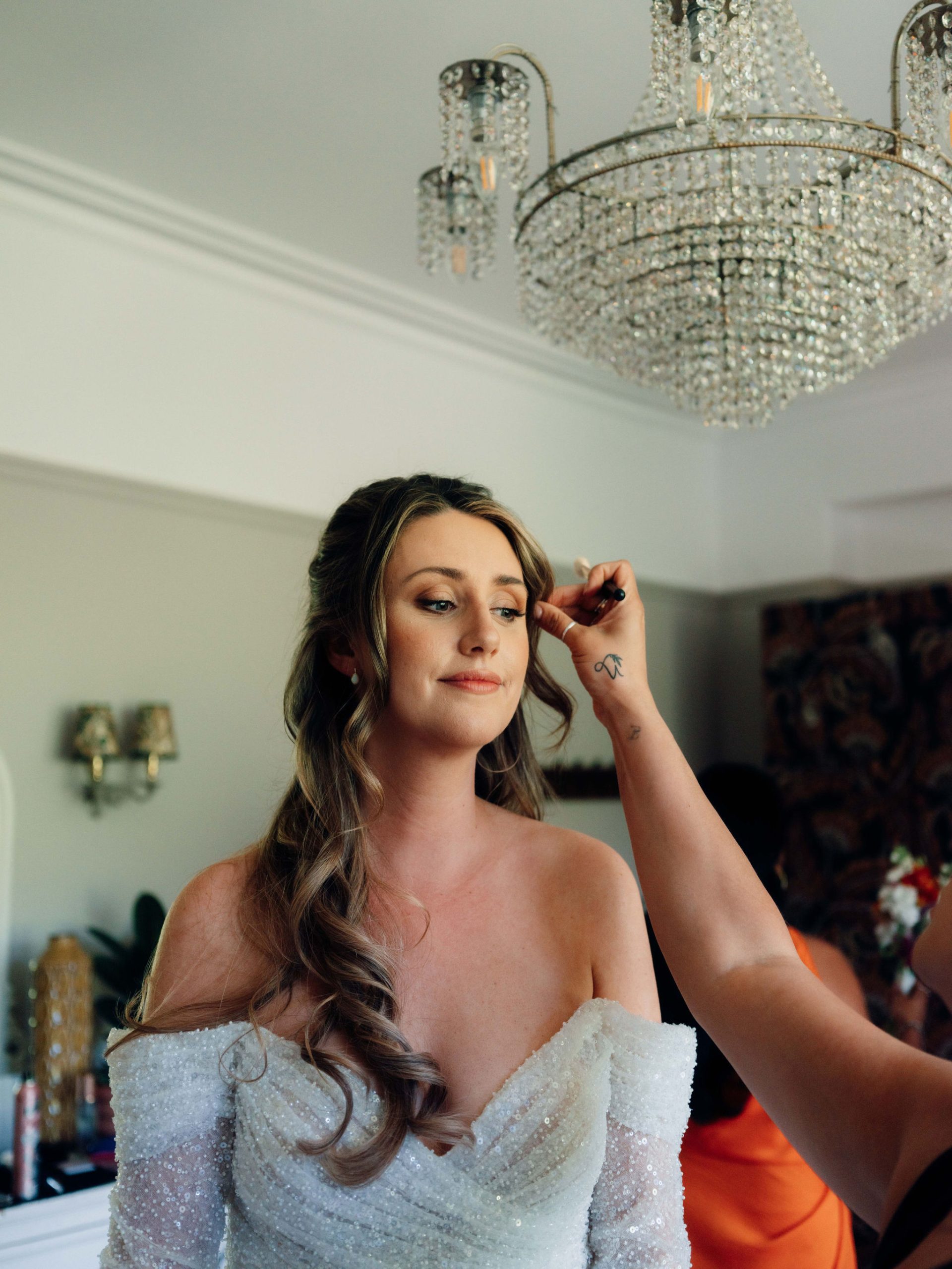 styled flatlay photograph of salon quality products, scissors and hairpins